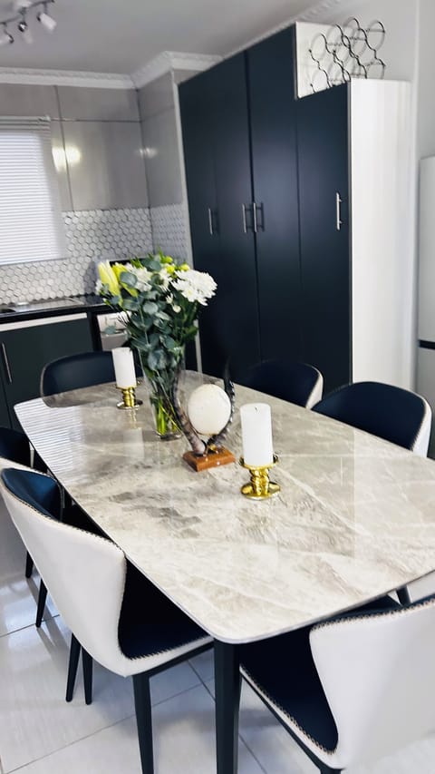 Standard Apartment | Private kitchen | Full-size fridge, microwave, oven, dining tables