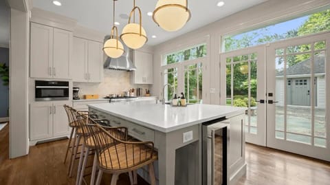 Bright and spacious gourmet kitchen featuring modern appliances.