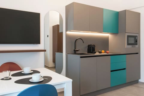 Standard/Quadruple Apartment | Private kitchen | Electric kettle