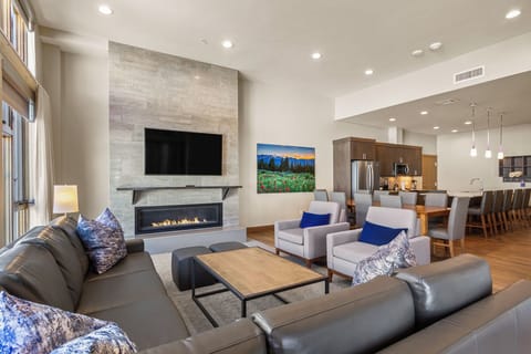 Cozy living room with gas fireplace and amazing views
