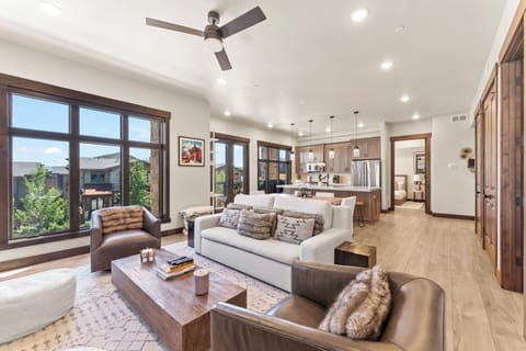 Open and inviting living area with ample seating, perfect for gathering with family and enjoying time together.