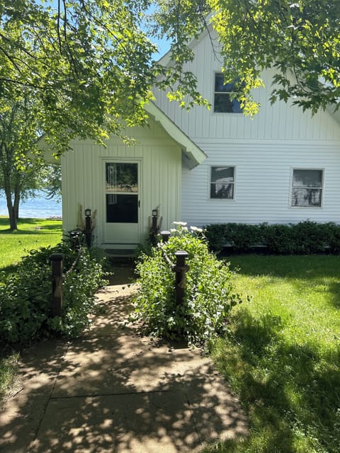 View of entrance which is behind the garage