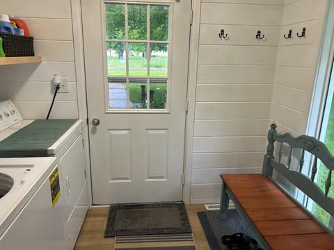 Entryway which includes washer/dryer