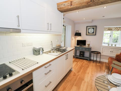 Fridge, electric kettle, cookware/dishes/utensils