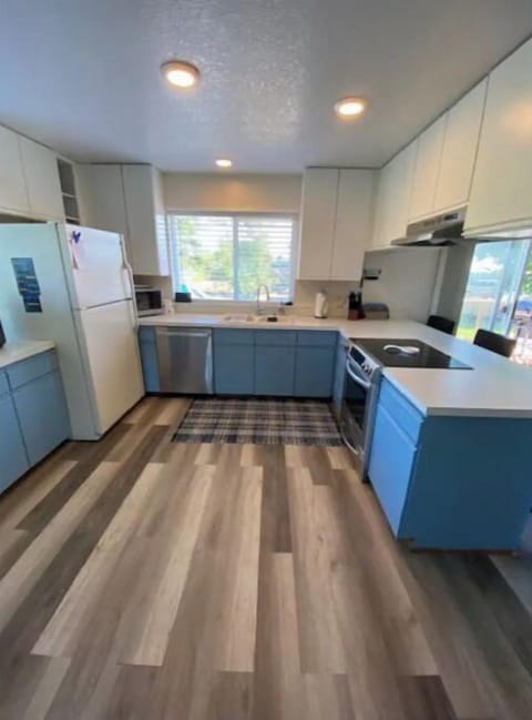 Fully equipped kitchen with lots of great natural light.