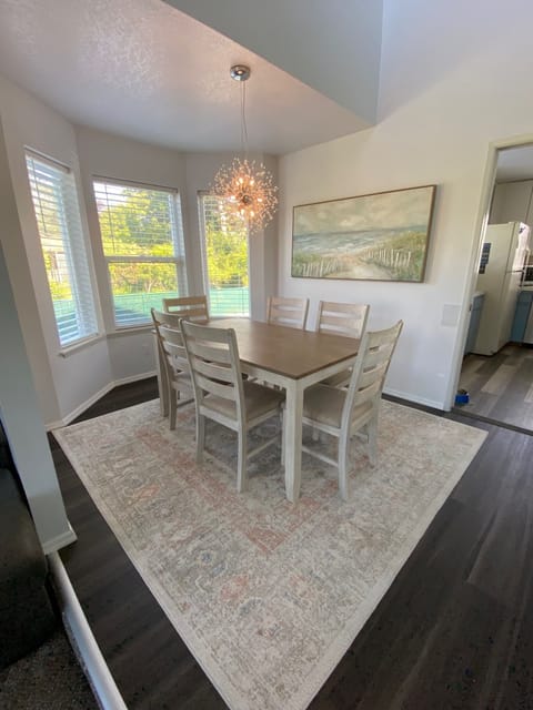 Dining room seats 6. 4 extra folding chairs in the garage, high chair in pantry.