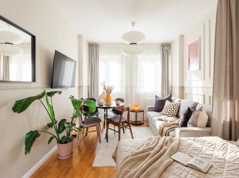 Photo of the room with queen size bed and convertible sofa to accommodate up to 4 guests