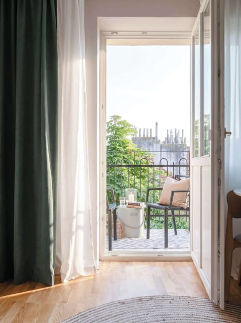 The private balcony with outdoor seating to enjoy sunny days