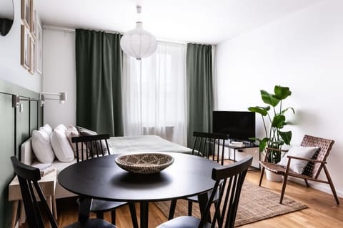 In the first bedroom there is queen size bed as well as kitchen and dinning area