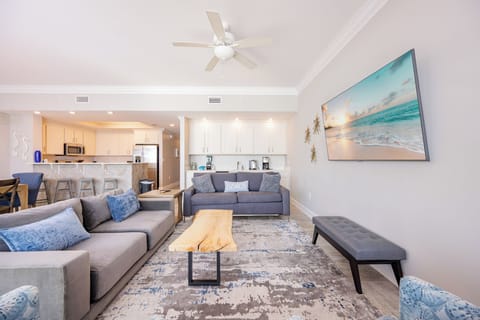 Sink into the plush sofa with queen sleeper, stream your favorite shows on the TV, and unwind in this living space