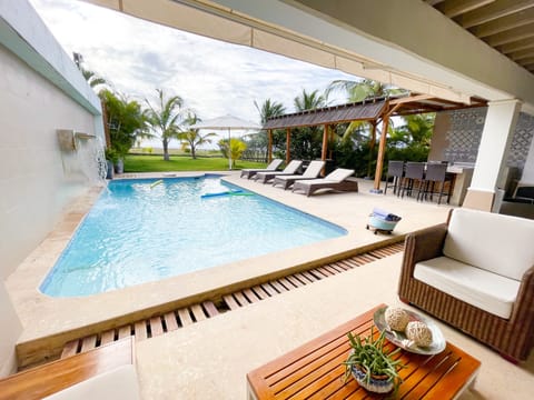 Outdoor pool, pool umbrellas, sun loungers