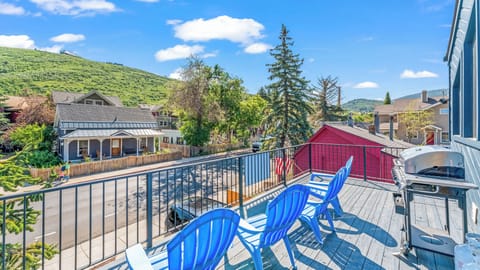 - Balcony with mountain views and blue Adirondack chairs  
- Outdoor grill for easy dining with scenic backdrop  
- Relax in fresh air while enjoying Park City charm