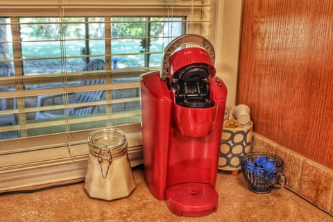 Keurig, coffee pods, cream, and sugar provided