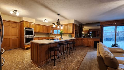 Huge Kitchen with tons of counter space and kitchen ware