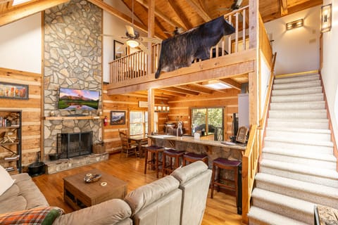 Main level common area and the stairway to the loft area.