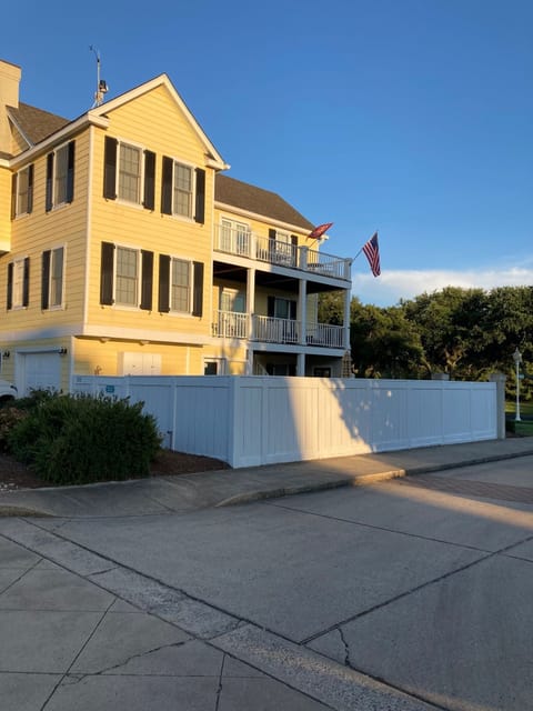 Side Entrance with Enclosed Patio Area and Porches