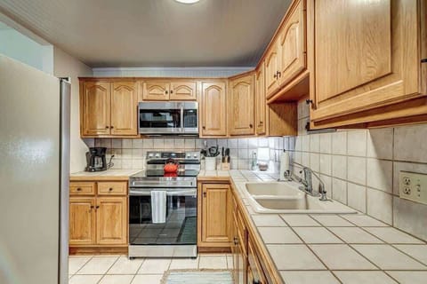 Another view of the kitchen which opens directly into both the living area and the dining area