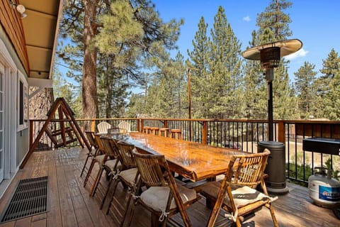 Dine alfresco at the outdoor table for 12 amongst views of pine trees with a heat lamp provided for cool evenings.