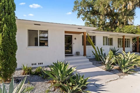 home exterior with a contemporary home design and a welcoming entrance