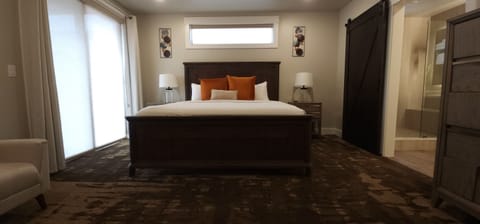 Spacious and inviting — this king bedroom is designed for comfort and privacy.