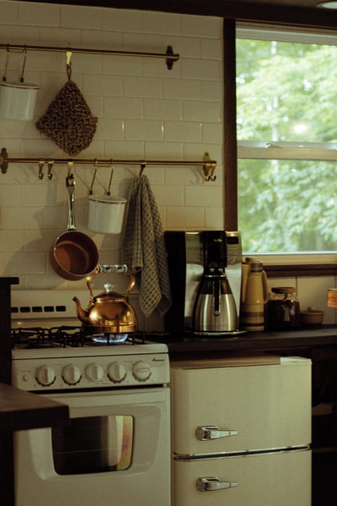 Microwave
4 Burner Stove/Oven
Fridge
Coffee Maker
Dishes, Cutlery, pots, pans..