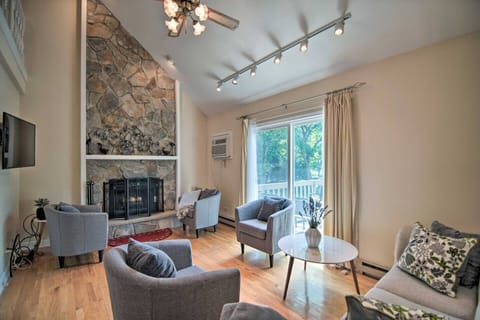 3Bd Side: Plenty of space is available in the 3Bd units living room to relax and watch the smart TV with family and friends, and enjoy the high-speed internet in front of the decorative fireplace.