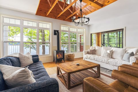 Living room with plenty of comfy seating and an indoor fireplace!