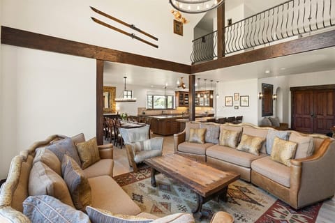 Comfortable living area with gas fireplace, smart-TV, comfy sofas and expansive views.