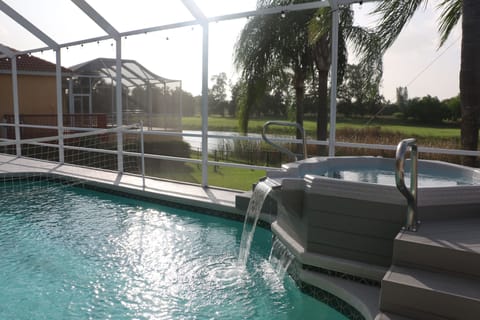 Our brand-new spillover Jacuzzi with twin waterfalls