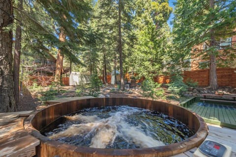 Take a dip in our custom cedar hot tub overlooking the beautiful backyard garden. 