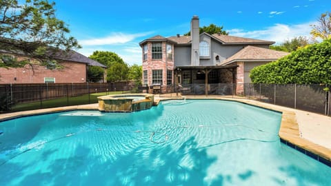 Heated Pool + Hot Tub. This is a fenced in area, added safety for families.