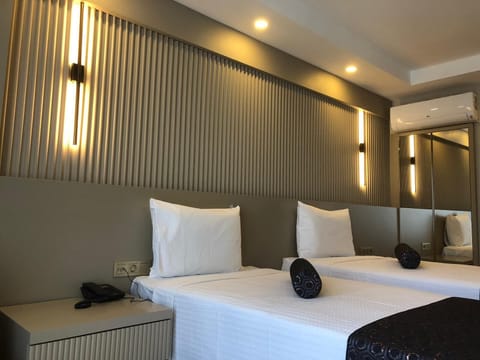 City Room | Premium bedding, minibar, in-room safe, desk