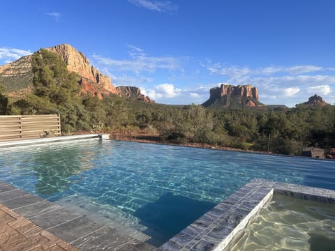 Views from infinity pool of Bell Rock, Courthouse Butte and Gibraltar. 