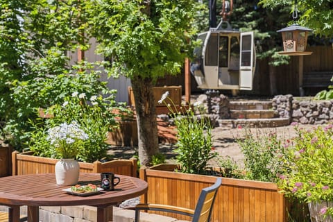 A truly unique amenity: a decommissioned alpine gondola thoughtfully repurposed into a private outdoor lounge for relaxing and taking in the mountain atmosphere.