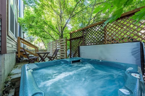 Private outdoor hot tub surrounded by trees, perfect after skiing at Park City Mountain.