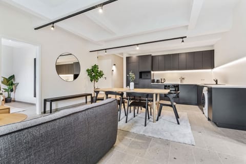 Our open-plan space combines the living area, dining, and kitchen, perfect for social evenings.