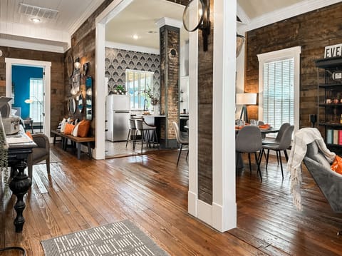 walk on 100 year old floors! The inventive architectural treatment extends to the reimagined "open" hallway!
