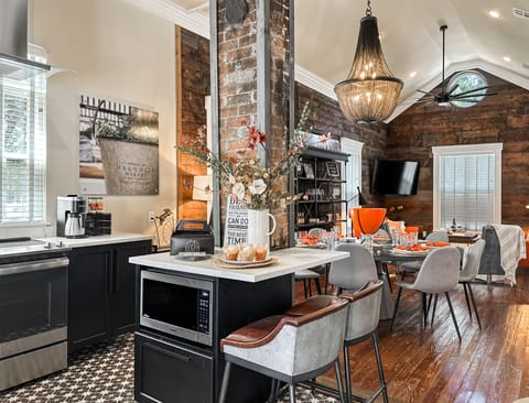 The long, open living and dining areas open right up to the kitchen...