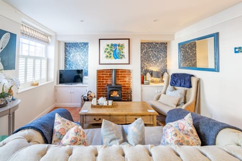 7 Albert Street, Holt: Sitting room with wood burning stove