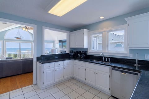 Kitchen Bar - From either end of the kitchen, you can pull up a stool and a meal or the view.