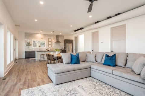Living room, dining and kitchen with a large deck (not shown here)