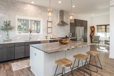 A perfect kitchen to prepare a meal. Pan, pots, and dishes provided