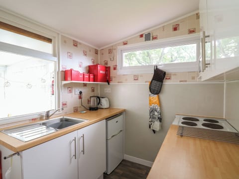 Fridge, electric kettle, toaster, cookware/dishes/utensils