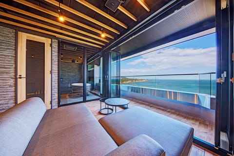 Deluxe Suite, Ocean View | In-room safe, desk, free WiFi, bed sheets