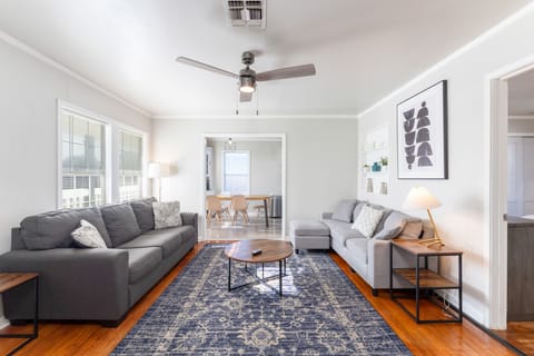 Spacious living room ideal for lounging and entertaining, featuring cozy seating and a welcoming atmosphere for gatherings or relaxing after a day of adventure.