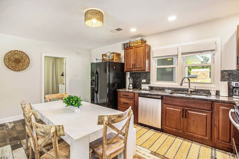 Dine in style at our eight-seater table, with a well-equipped kitchen.