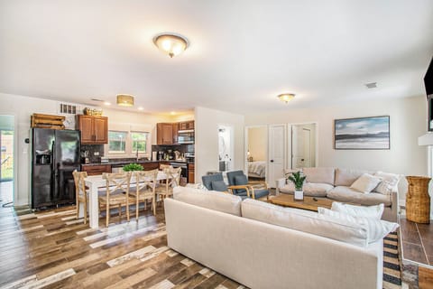 The spacious living area blends into the open kitchen and dining space.