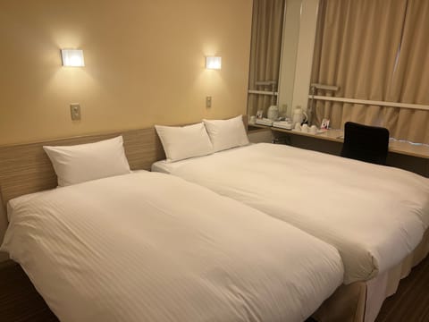 Desk, iron/ironing board (on request), WiFi (free), bed sheets