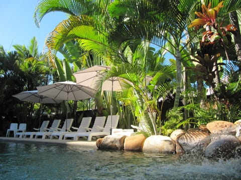 Outdoor pool, pool umbrellas, sun loungers