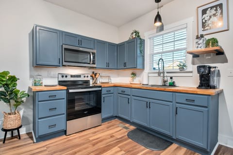 Plenty of cabinet storage with a full sized oven and microwave